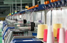 Textile industry with knitting machines in factory