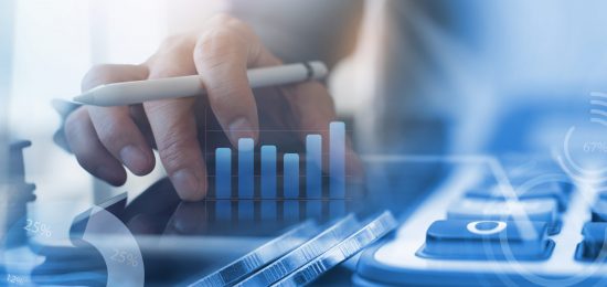 Business analysis, accounting and finance investment concept. Double exposure of business man working on digital tablet and coins with digital diagram, business data, financial graph